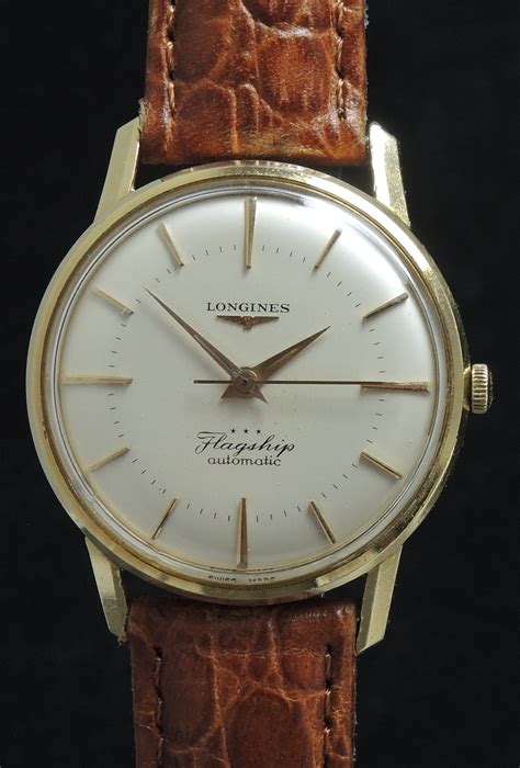 vintage longines 18k gold watches